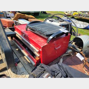 Metal chest of drawer with assorted pipe fittings