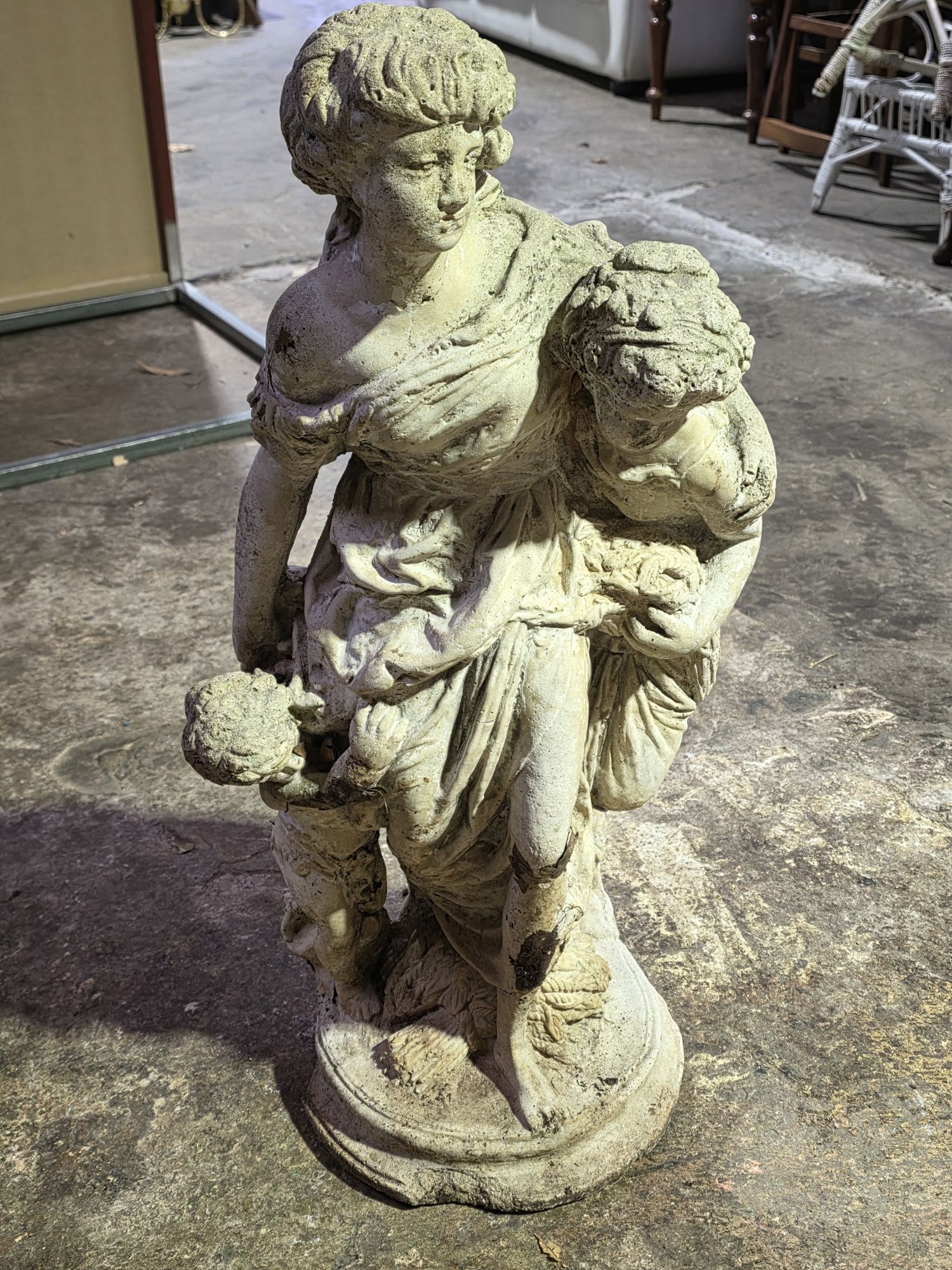 64 · CONCRETE STATUE