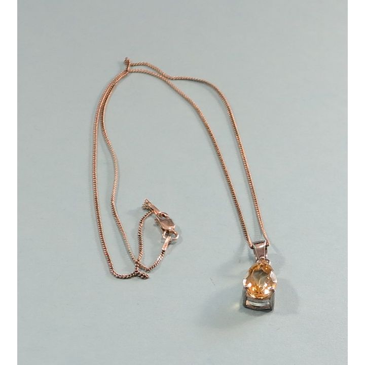 A STERLING SILVER AND CITRINE PENDANT,