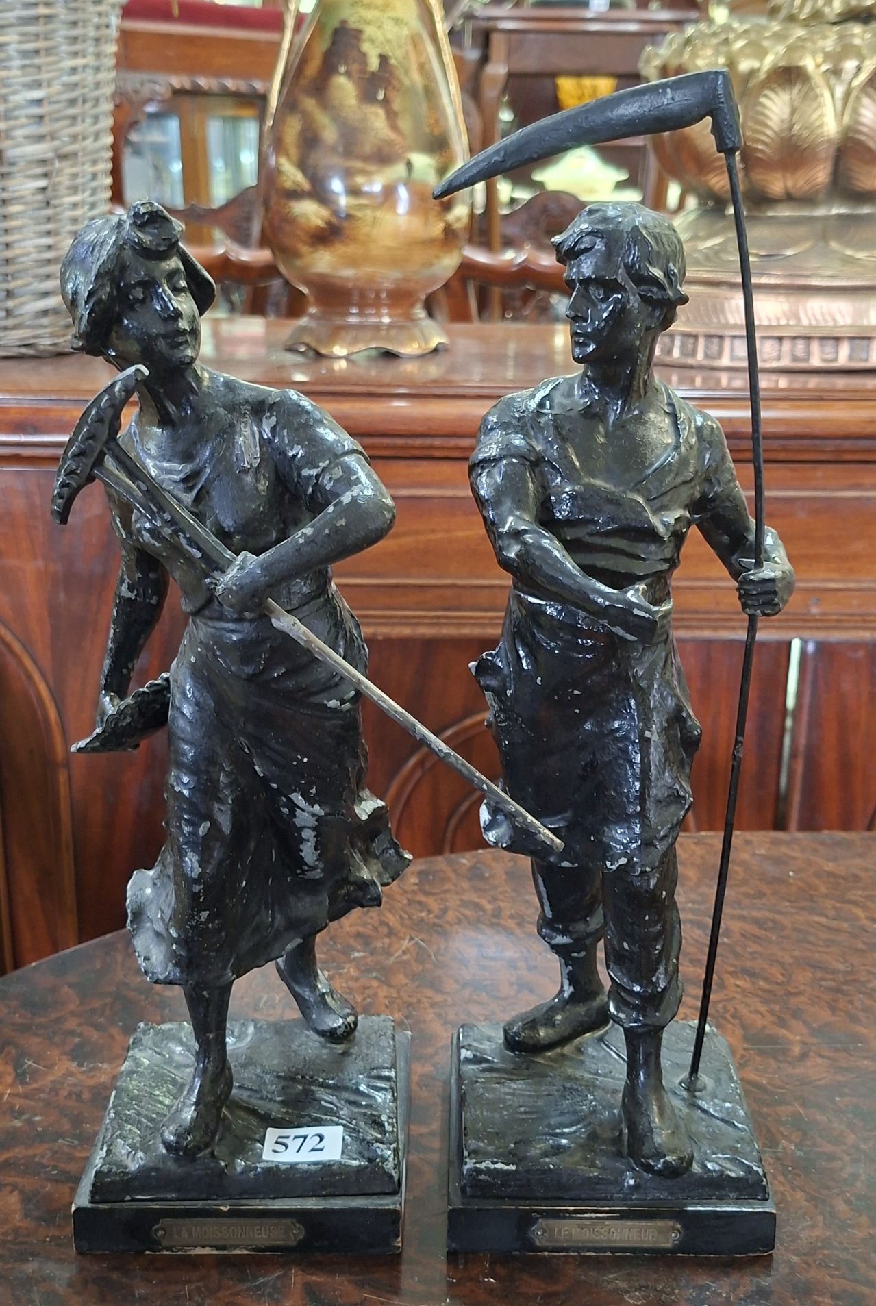 A Pair Of Harvest Ware Statues