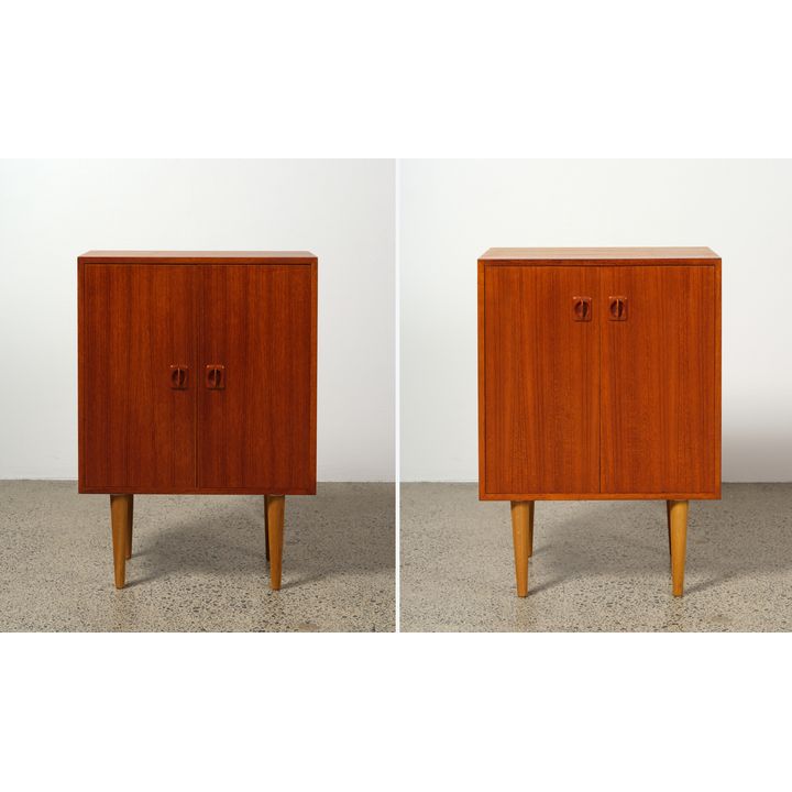 Matched pair of small Danish two-door upright cabinets