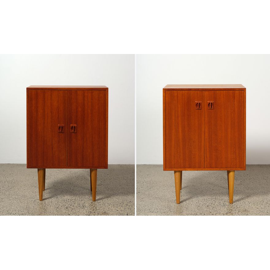 Matched pair of small Danish two-door upright cabinets