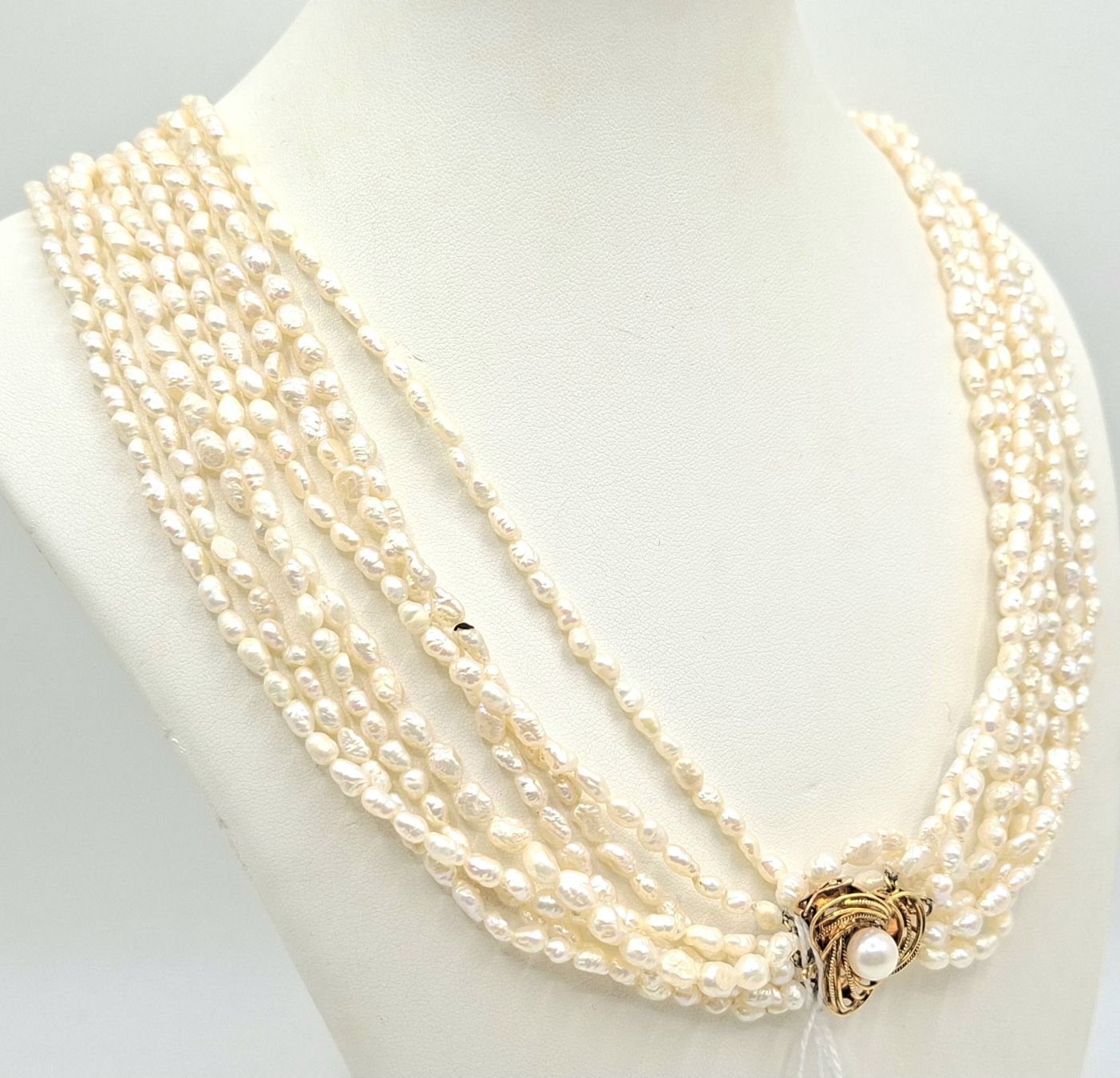 1145 · EIGHT STRAND SEED PEARL NECKLACE