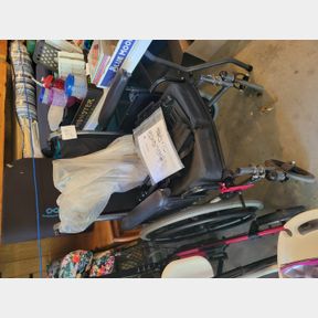 Wheel Chair with accessories with a new oxygen tank bracket