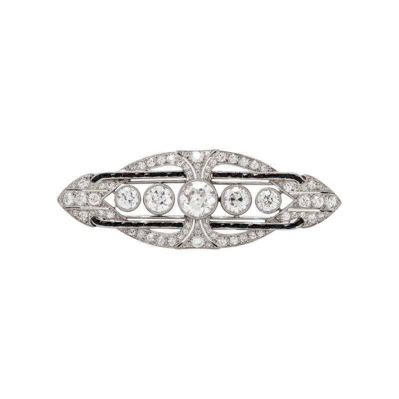 ART DECO, PLATINUM, DIAMOND, AND ONYX BROOCH