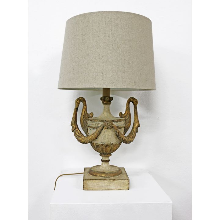 Carved wooden table lamp with swag decoration