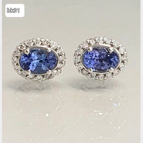 1.08CT OVAL TANZANITES SURROUNDED BY 32 DIAMONDS IN WHITE GOLD EARRINGS