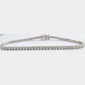 CAPTIVATING 3.77CTS OF 70 ROUND DIAMONDS IN WHITE GOLD TENNIS BRACELET COLOUR I/J CLARITY SI