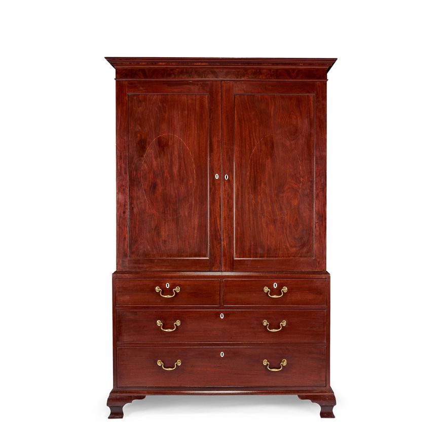 A George III mahogany and chequerbanded linen press