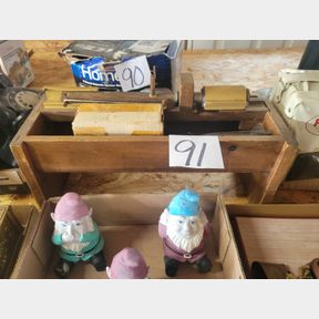 Vintage rubber band Nutcracker with collection tray