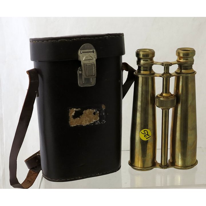 A PAIR OF CASED 20TH CENTURY BRASS BINOCULARS.