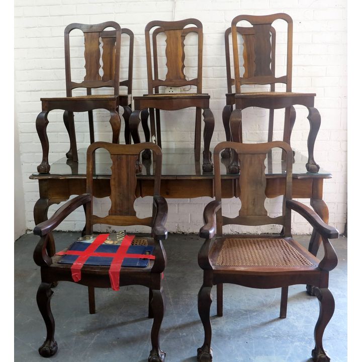 STINKWOOD TABLE AND 8 CHAIRS,