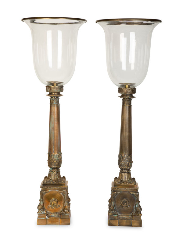 A Pair of Continental Cast Metal Hurricane Candlesticks
Height 36 inches. 