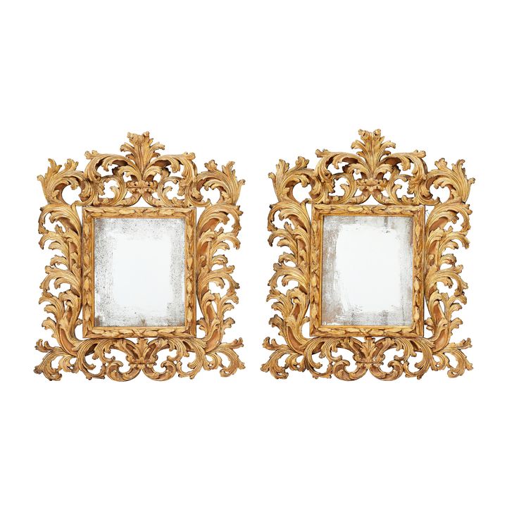 A pair of 17th century style Florentine carved gilt wood mirrors