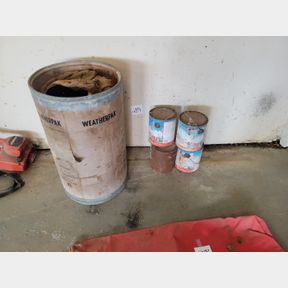 Cardboard barrel and 4 gallons of metal primer