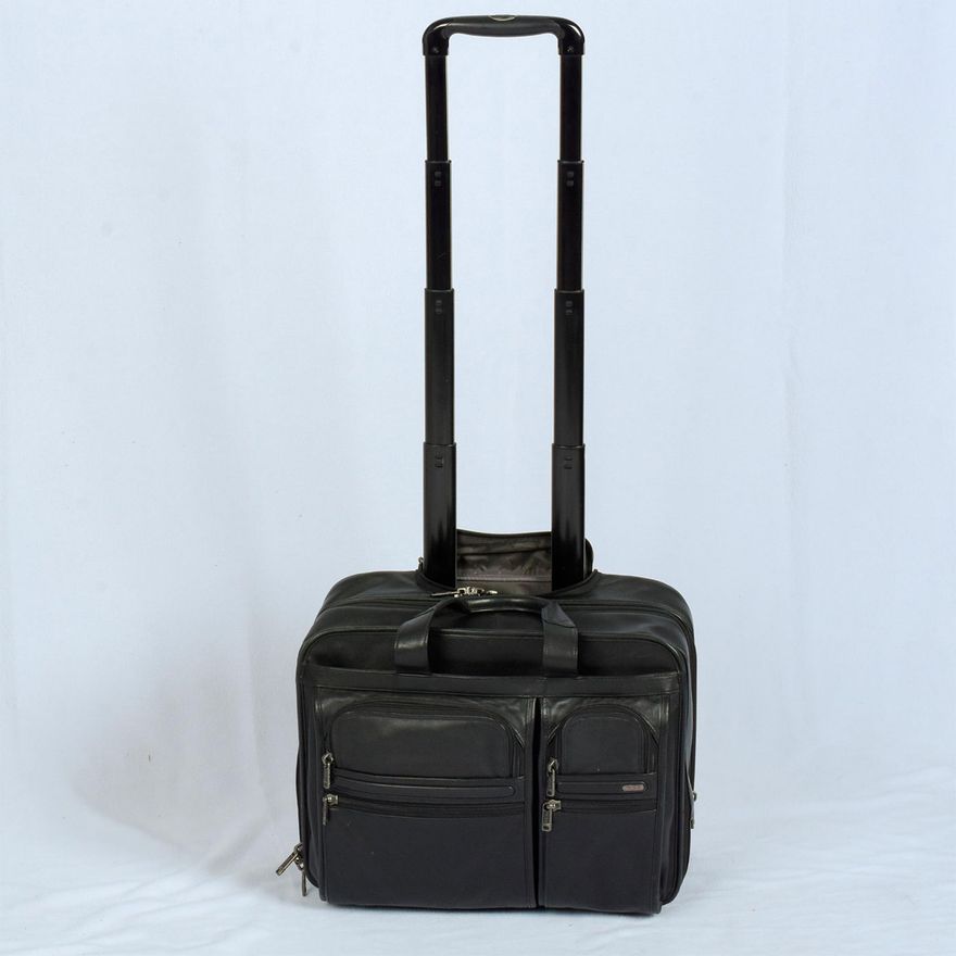 TUMI Black Leather Compact 2 Wheeled Brief Bag | Lion and Unicorn