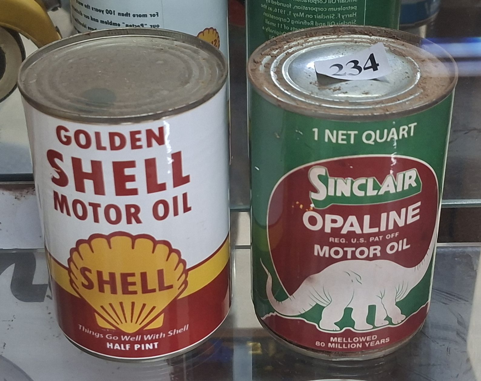 2 OIL CANS