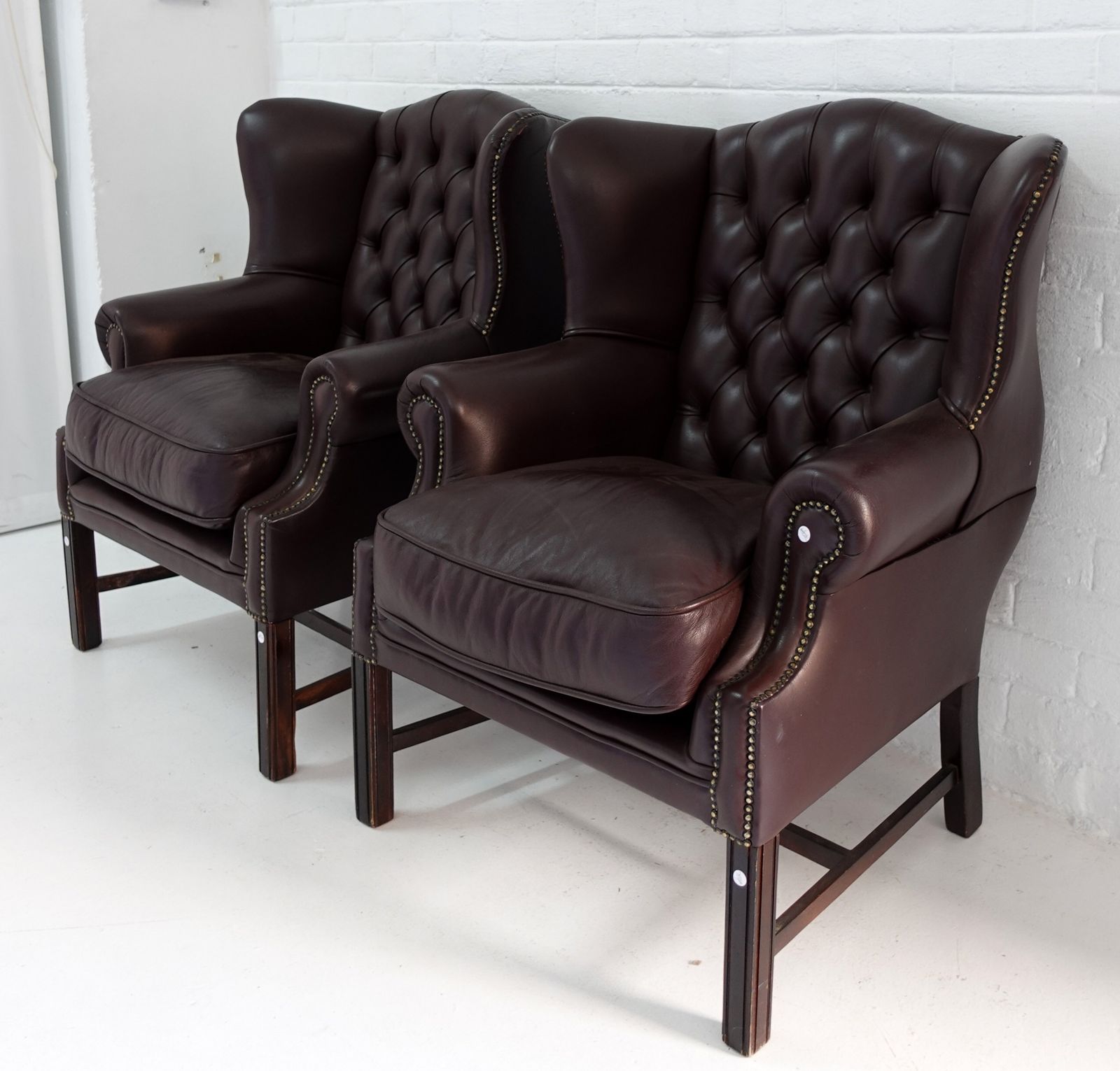 PAIR OF WETHERLYS LEATHER WINGBACK CHAIRS Westgate Walding Auctioneers