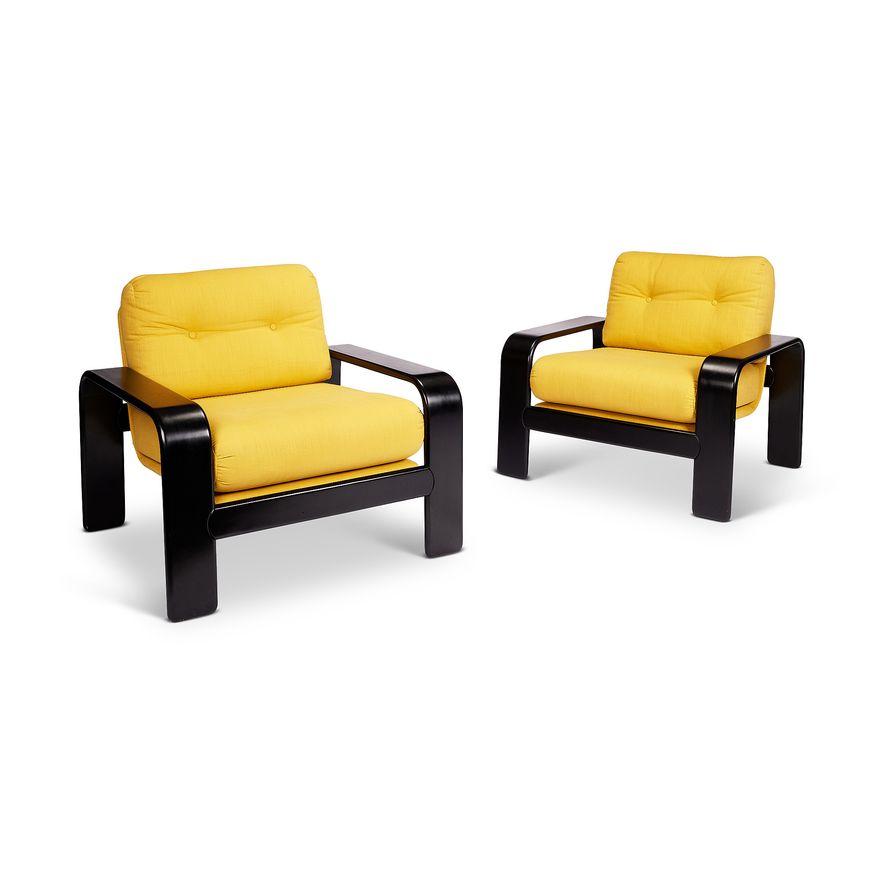 A pair of 20th century Finnish ebonised yellow upholstered armchairs