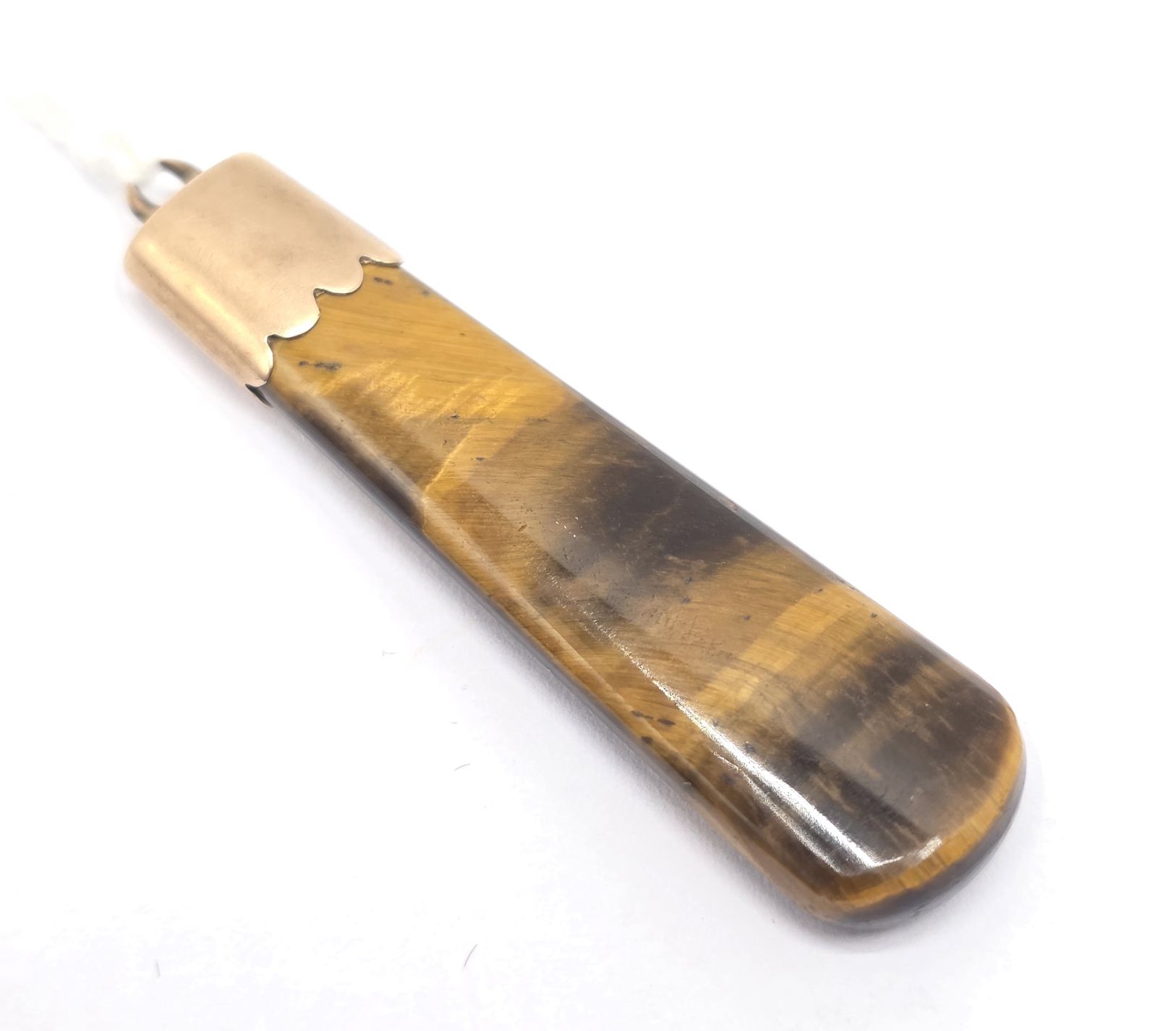 57 · 9CT ROSE GOLD AND TIGERS EYE PENDANT