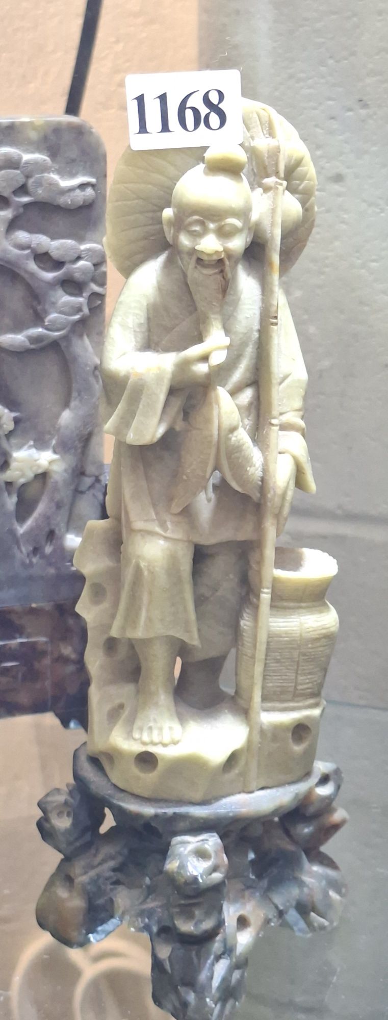 1168 · CARVED STONE FIGURINE