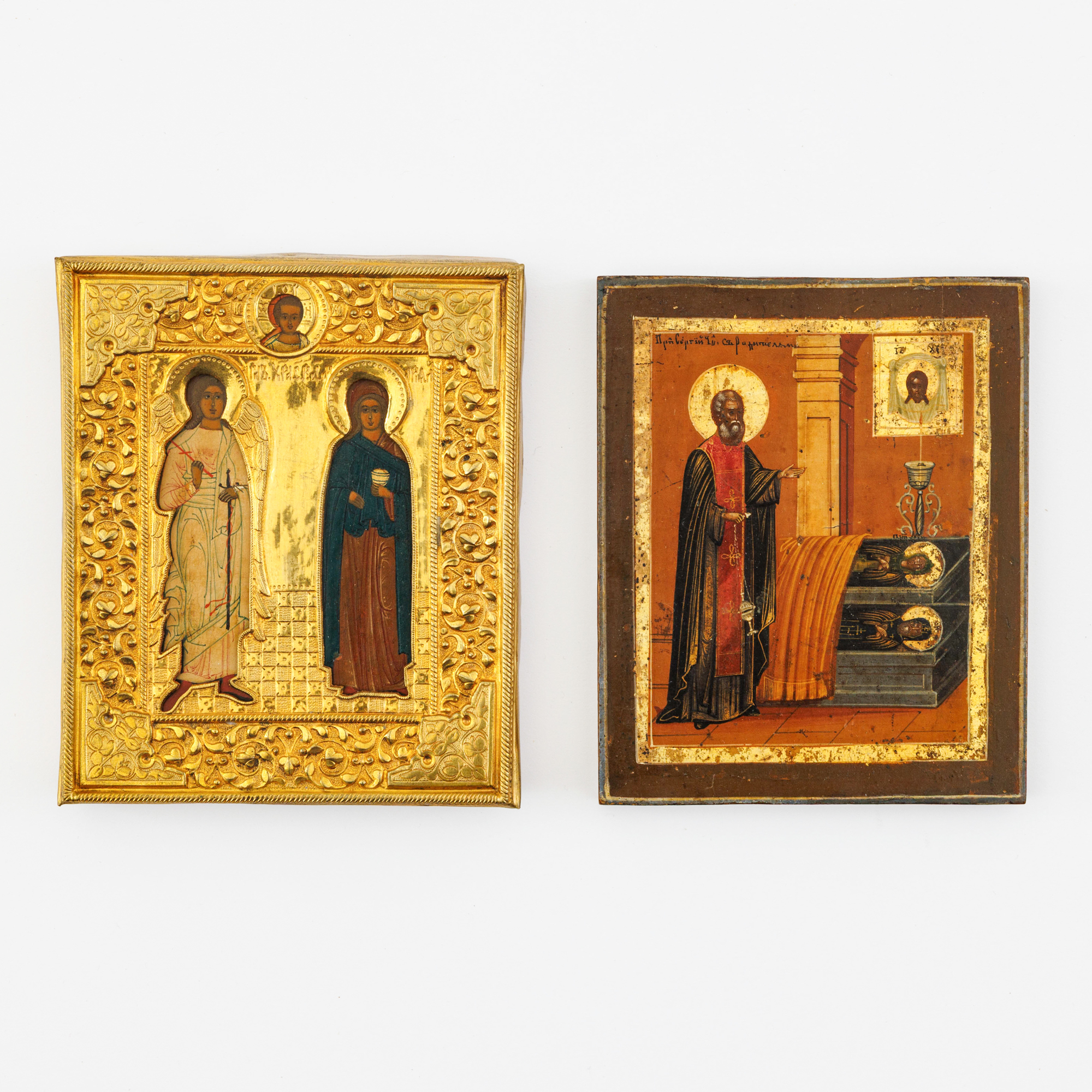 Two19th-century traveler icons painted in tempera on panel. One with a gilded oklad – kavel bij Bernaerts, Antwerp
