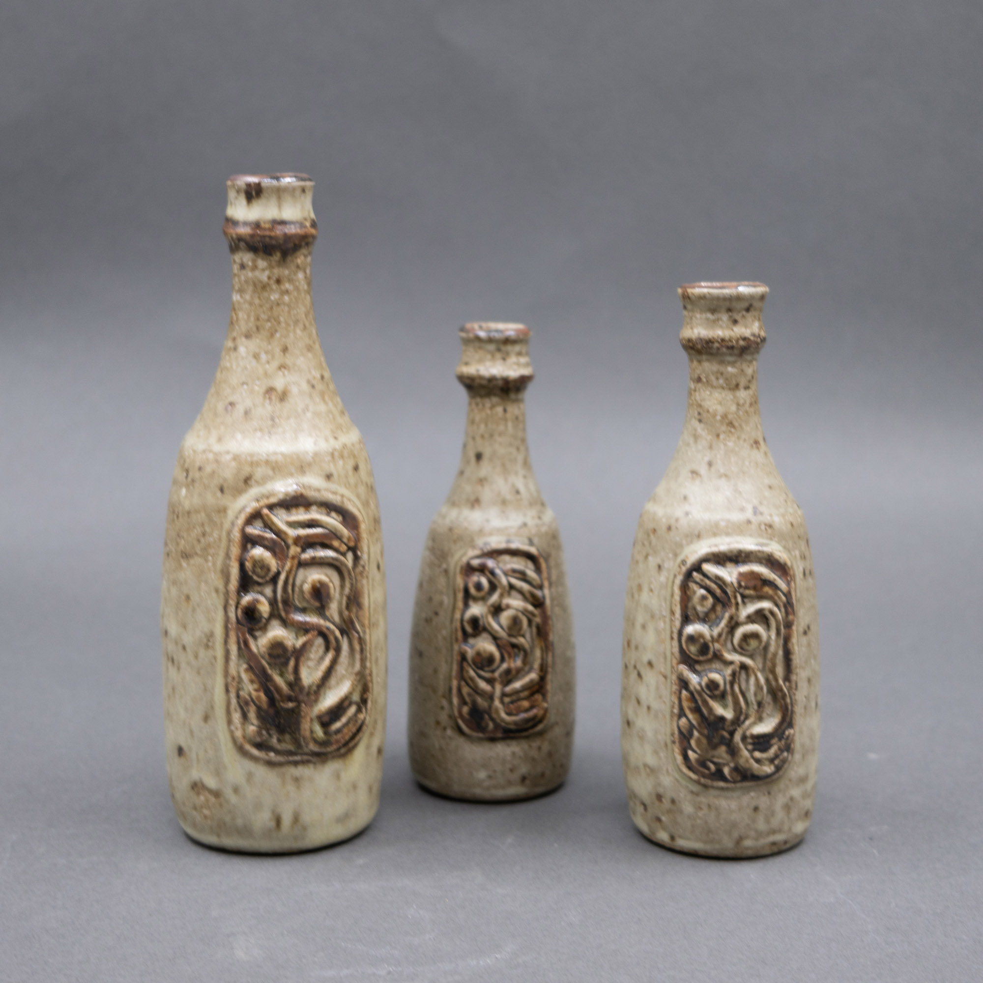 Potter Unknown - Three small bottle vases — sold at auction in New Zealand for $20