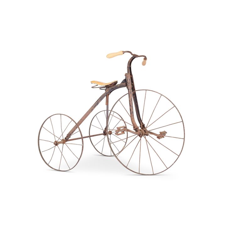 A vintage iron child's tricycle