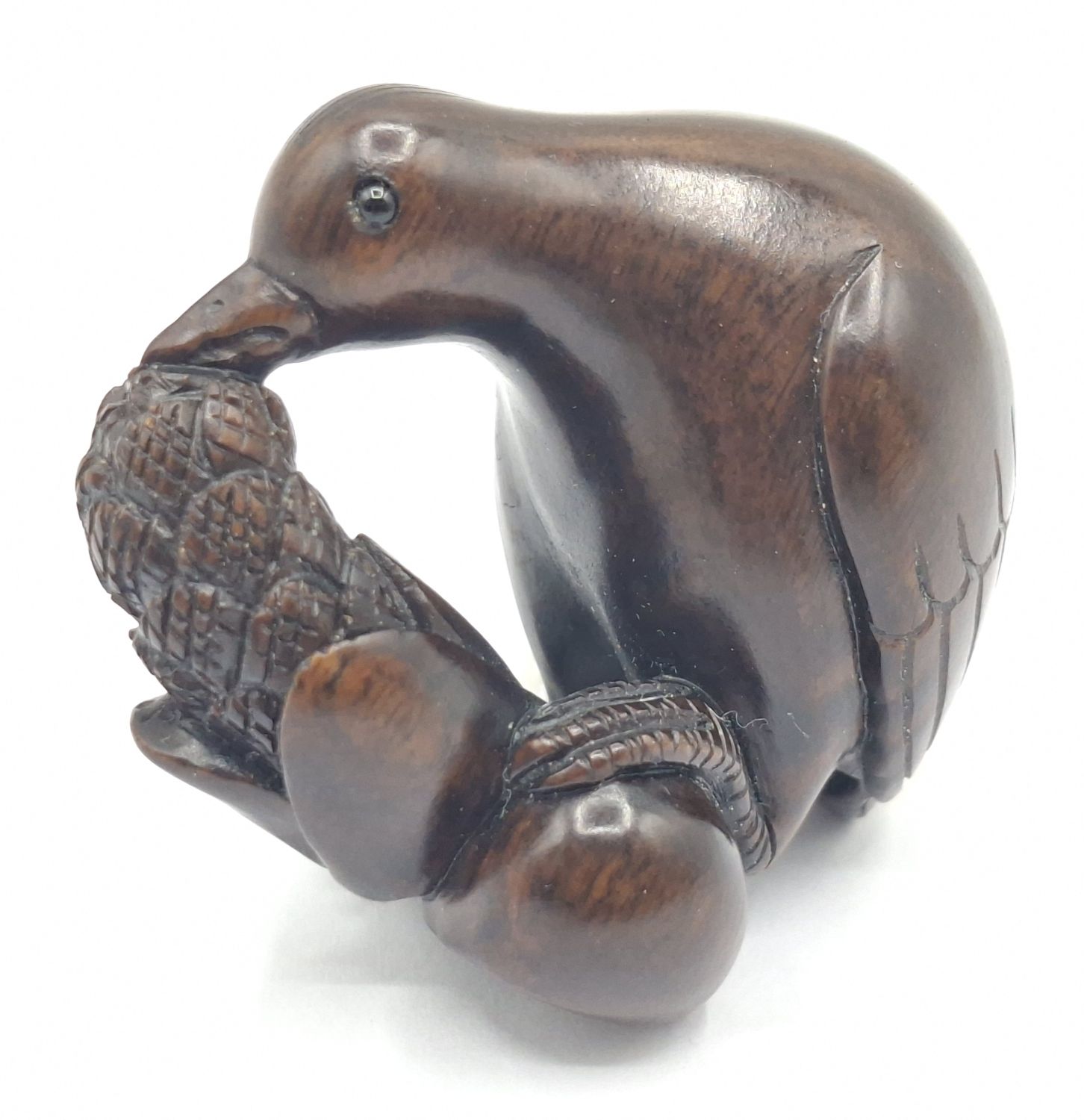 126 · JAPANESE CARVED ROSEWOOD NETSUKE