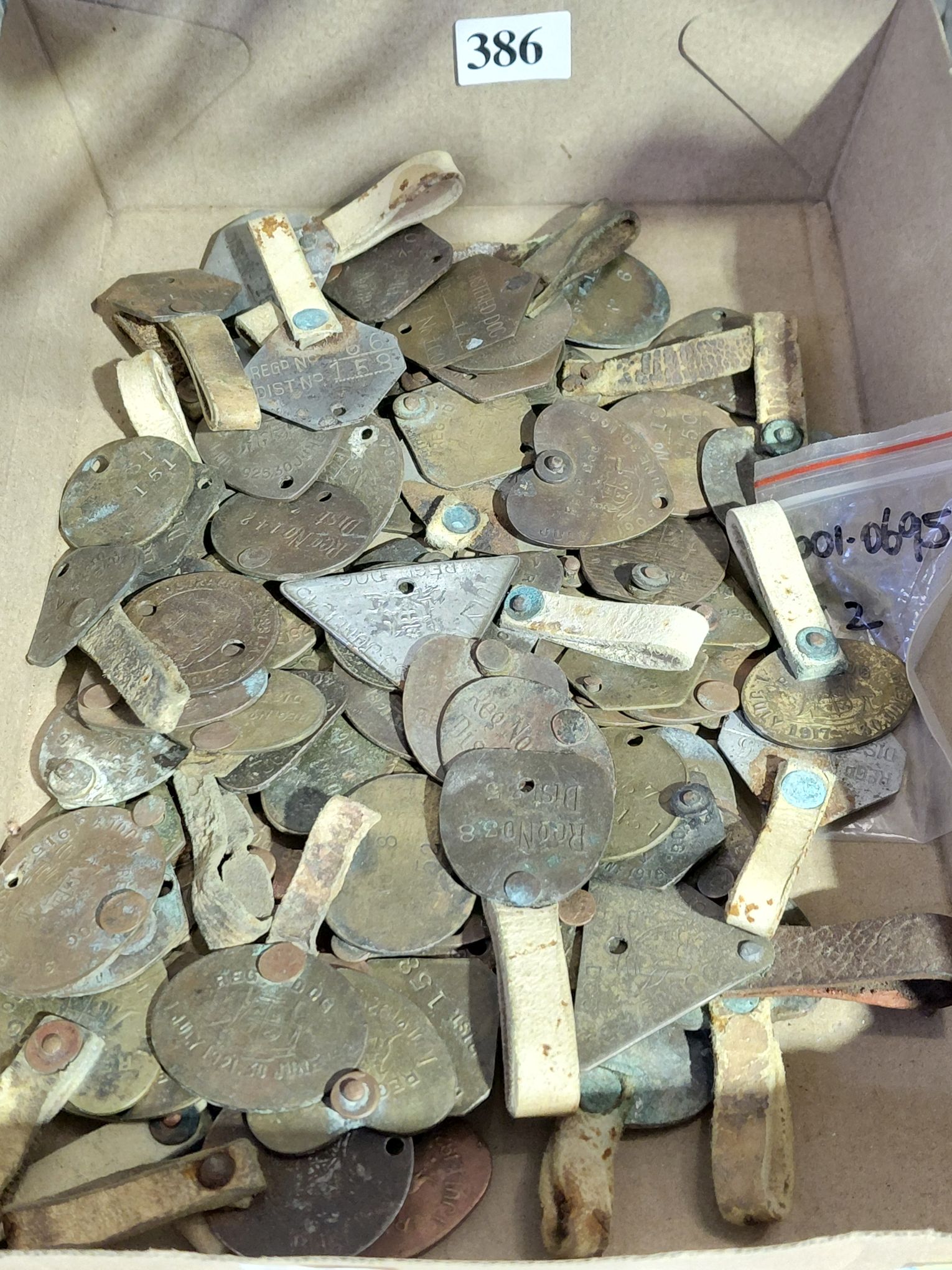 386 · ANTIQUE AND 20TH CENTURY DOG TAGS