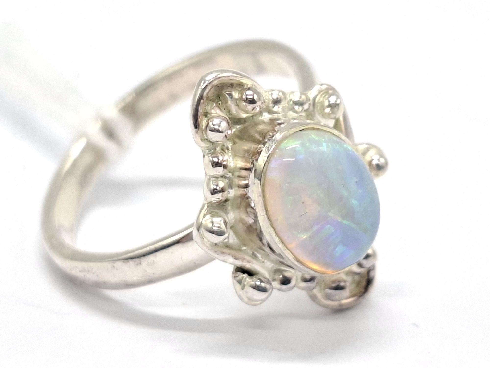 1058 · STERLING SILVER OPAL RING