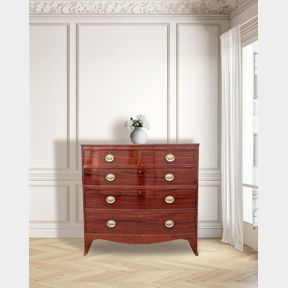 A VERY FINE GEORGIAN MAHOGANY BOW FRONTED CHEST OF DRAWERS, dating to circa 1800, with an arrangement of 2 ove