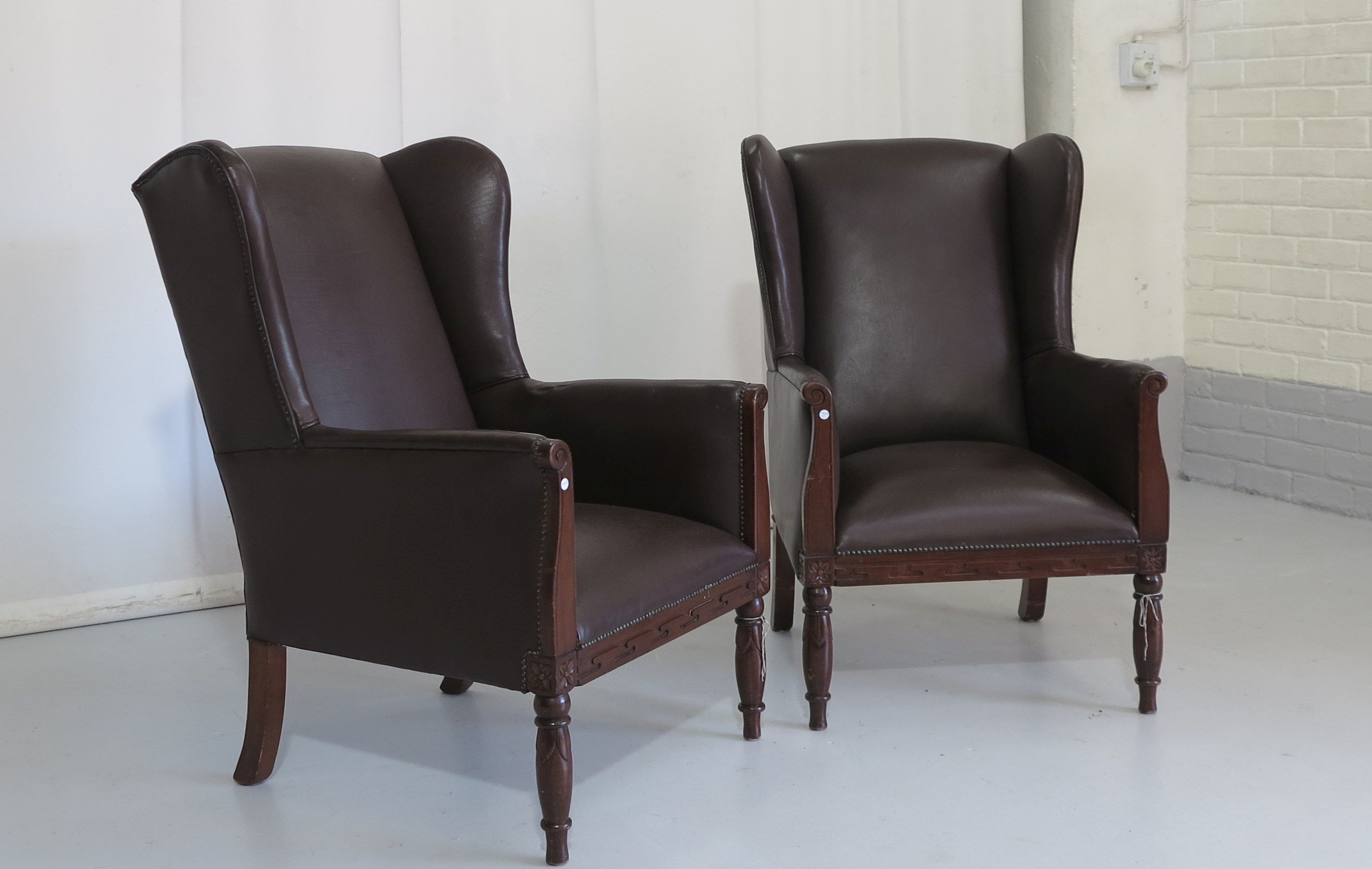 PAIR OF LEATHER UPHOLSTERED WINGBACK CHAIRS | Westgate Walding Auctioneers