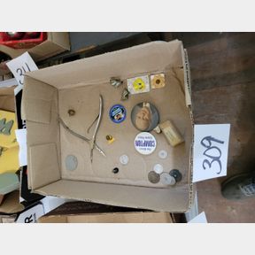 Assorted tokens, buttons, and other small items