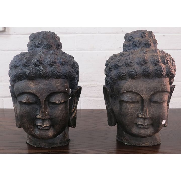 PAIR OF RESIN BUDDHA HEADS
