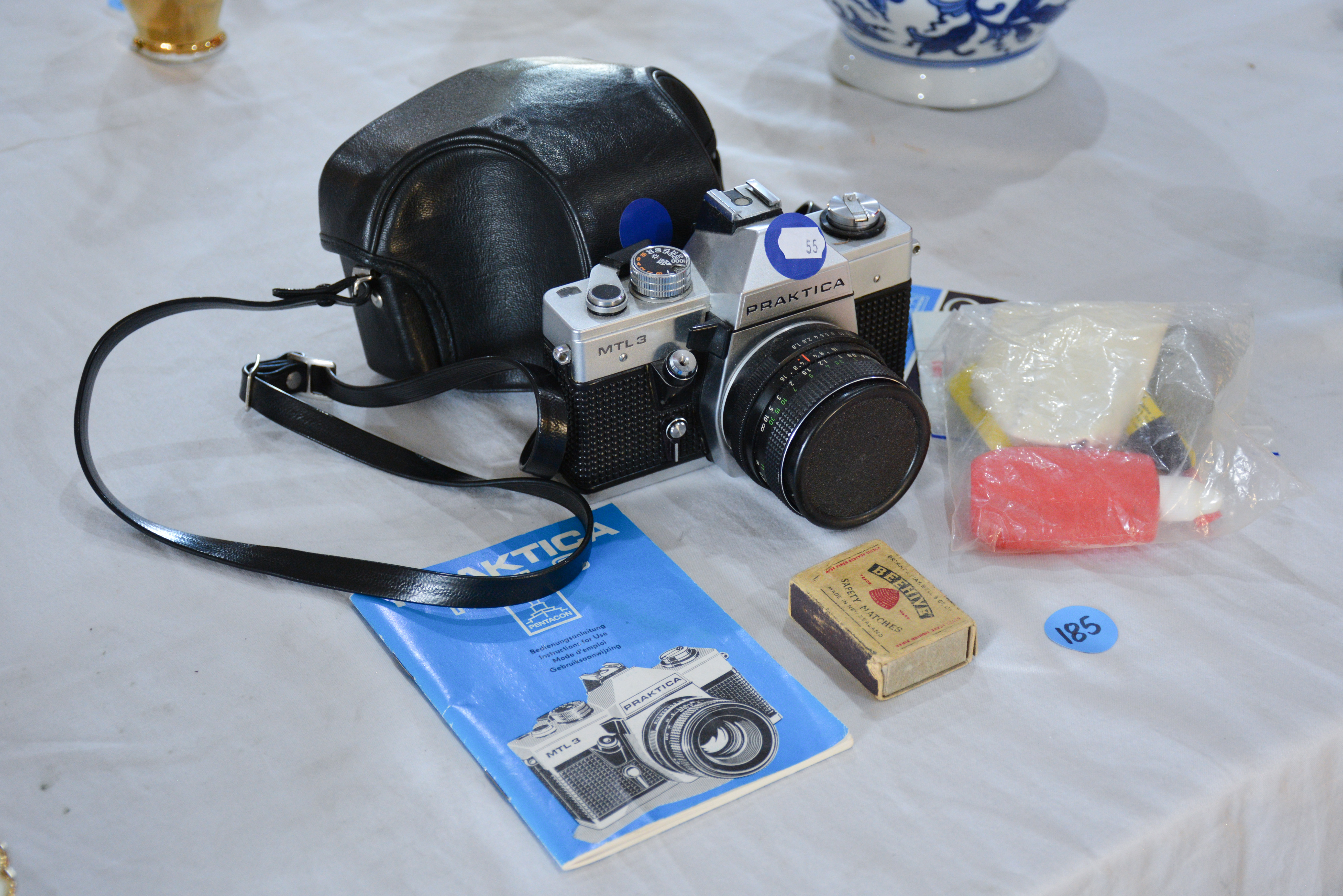 Praktica MTL3 Camera and Accessories — sold at auction in New Zealand for $10