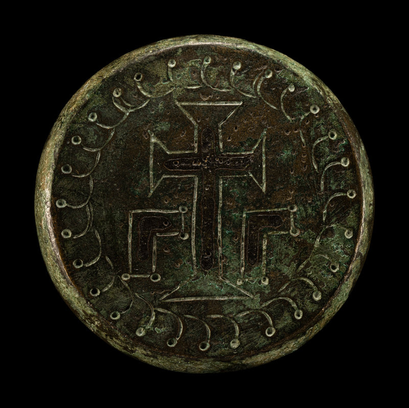 A Byzantine Bronze Weight
Diameter 1 7/8 inches (5 cm).