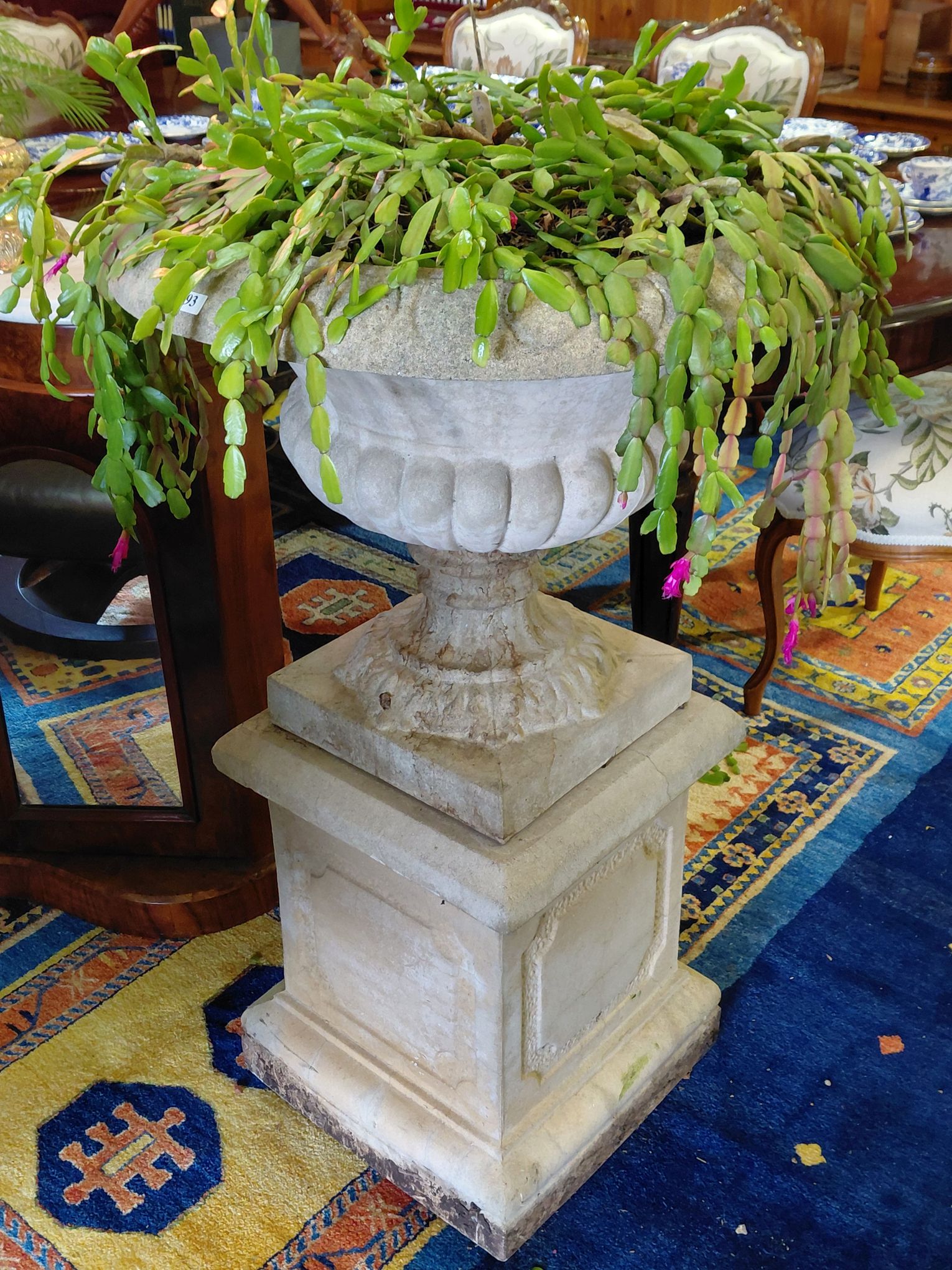93 · LARGE CONCRETE URN ON SQUARE PLINTH