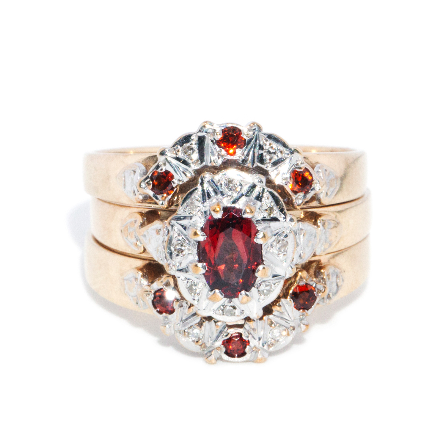 166 · 9ct Gold Garnet & Diamond Three Ring Set