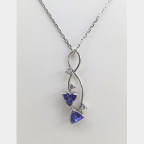 1.09CT OF BRILLIANT CUT DIAMONDS AND TANZANITE ON 18CT WHITE GOLD PENDENT - 50692/335