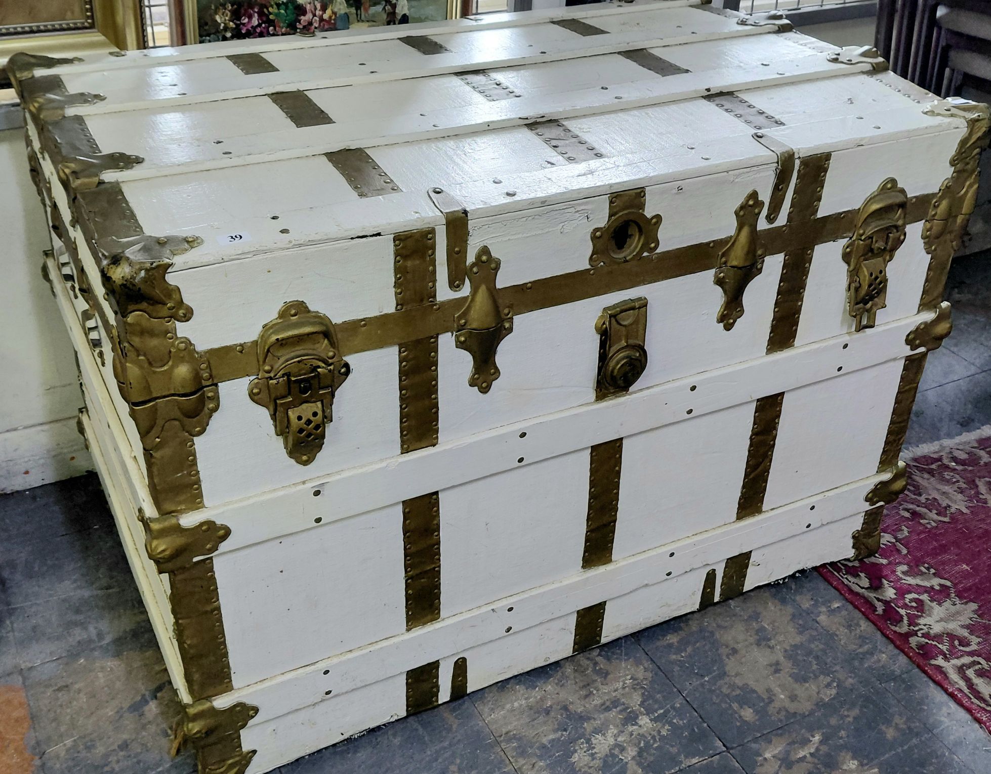39 · AN EARLY TRAVEL TRUNK