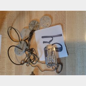 Vintage dog tag and other antique aluminum tags