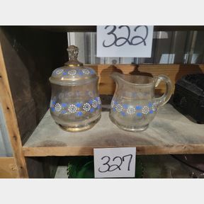 Gold rimmed hand painted creamer and sugar containers