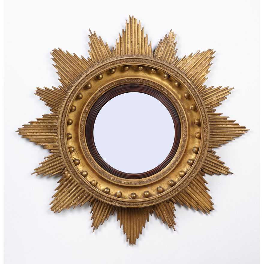 Regency period circular gilded mirror with starburst