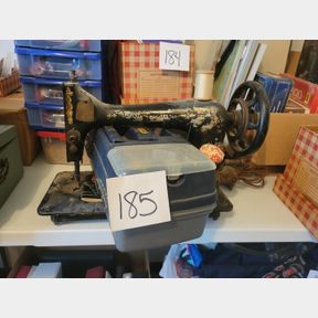 Antique Singer sewing machine and some accessories