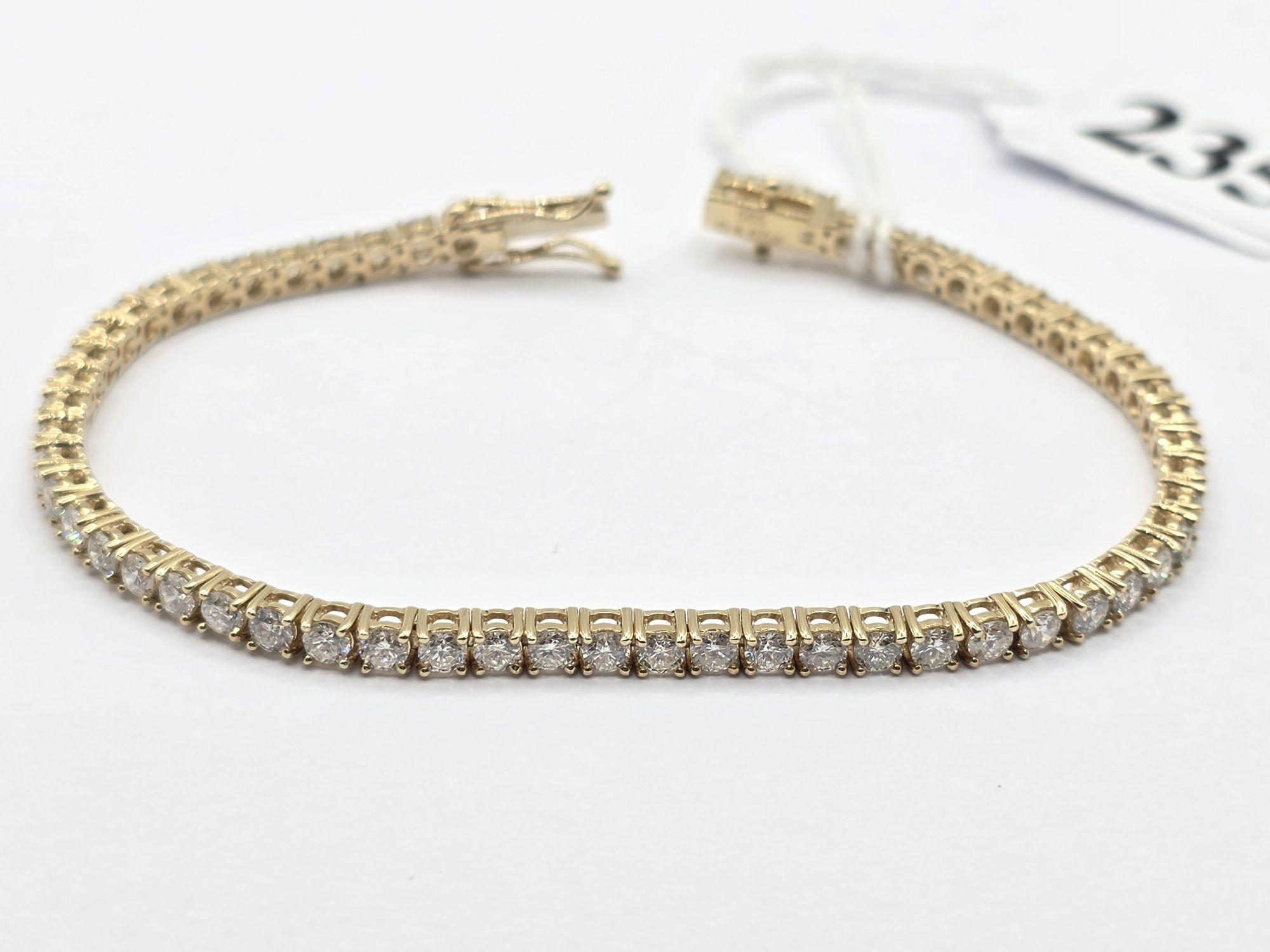 235 · 14K GOLD TENNIS BRACELET