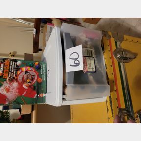 Plastic file drawer of misc. linens and fur pieces