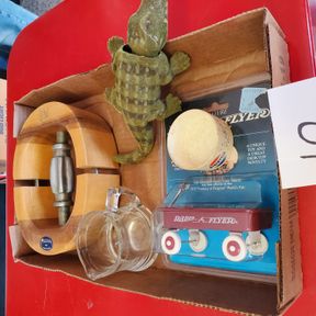 Radio Flyer, hat stretcher, Kellogg's cup, bobble alligator