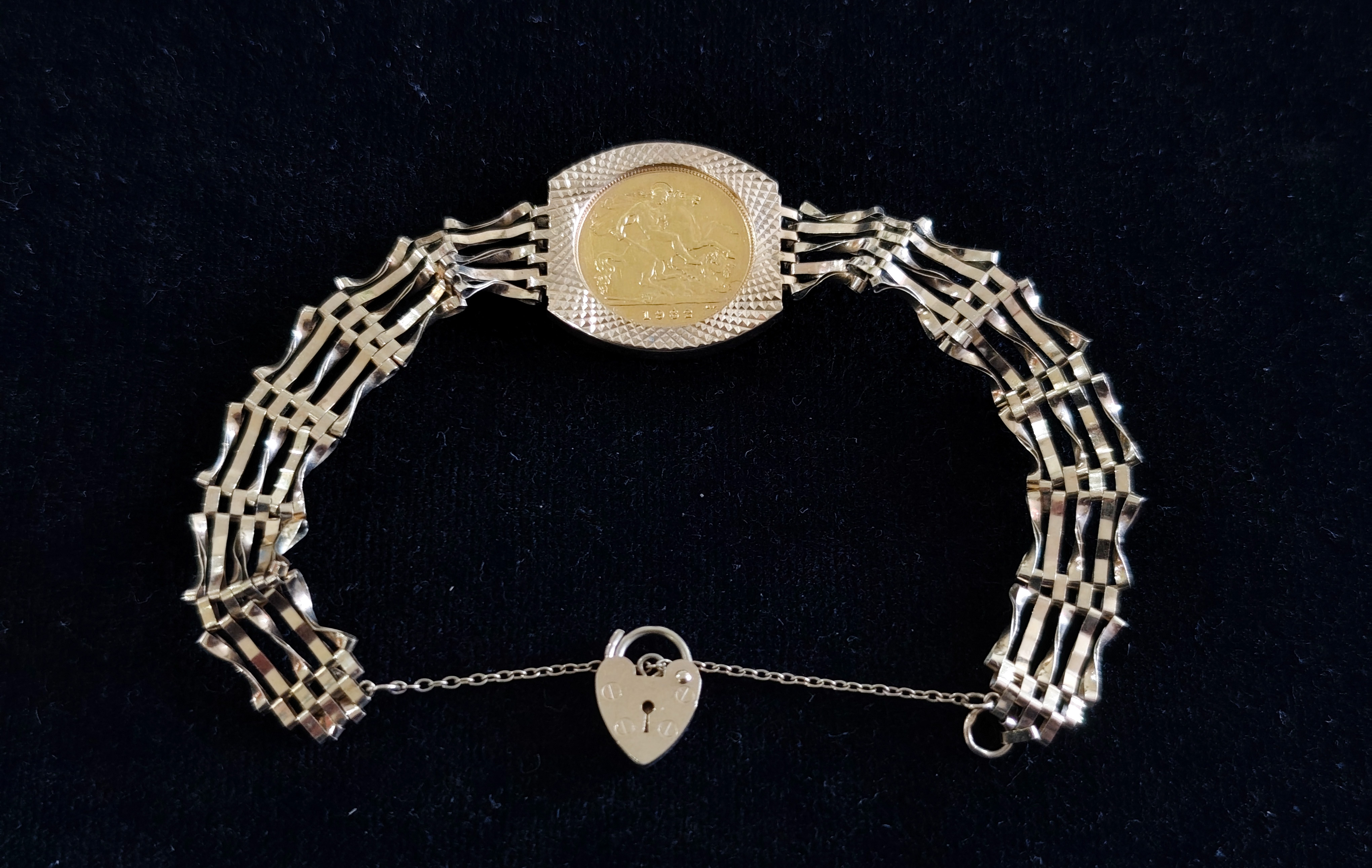 9ct Gold Bracelet w 22CT Half Sovereign — sold at auction in New Zealand for $1,100