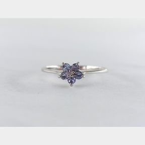 0.125CTS TANZANITES IN WHITE GOLD FLOWER RING
